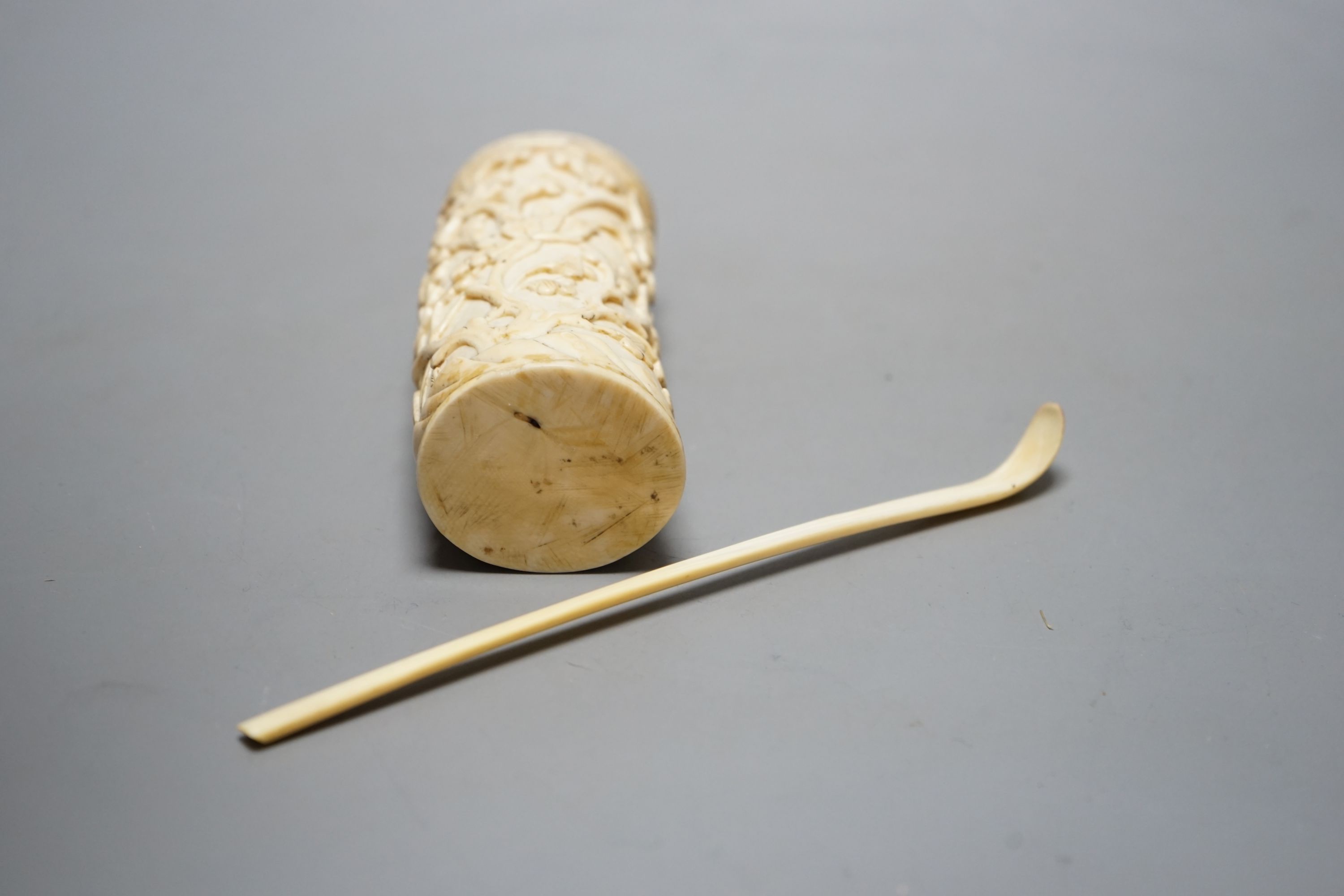 A Chinese 19th century ivory snuff spoon and a brush pot with lady, brush pot 12 cms high.